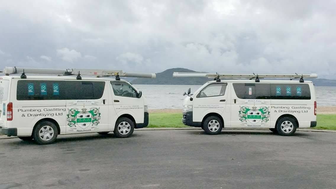 Hutchison Plumbing branded vans by the Rotorua lakefront